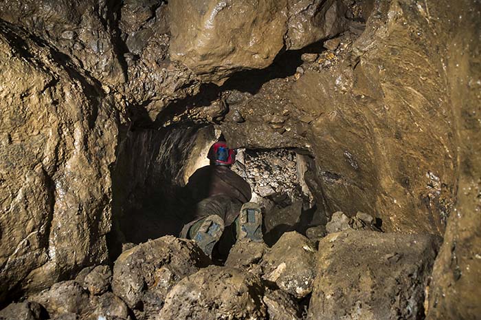 Lisa Wootton in Pebble Arch Passage. Photo: Phil Wolstenholme